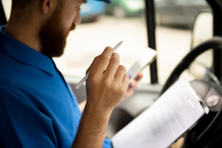 Commercial driver reviewing CDL renewal compliance checklist for 2026